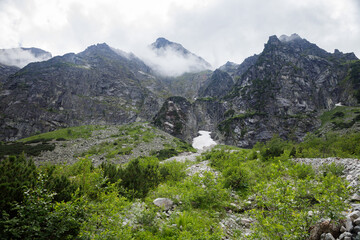 Landscape with blue clouds over mountains and forest, Zakopane, Morskie Oko, Poland