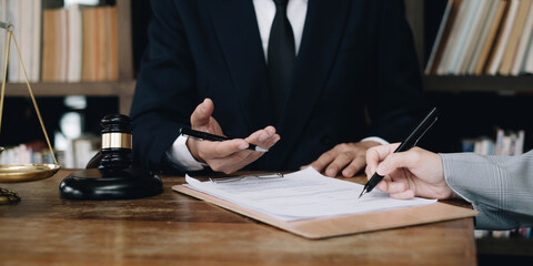 Group of business people and lawyers discussing contract papers ,Consultation between a male lawyer and businessman concept