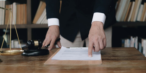 business people and lawyers discussing contract papers.Legal planning. Concepts of law, advice, legal services