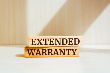 Wooden blocks with words 'Extended Warranty'.