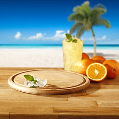 Desk of free space with ice cubes and summer landscape of beach 