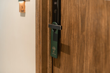 Door knob with blank doorhanger mock up.