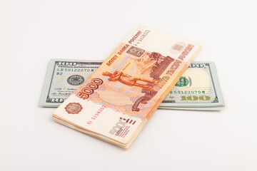 US Dollar and Russian ruble. Money background. Currency exhange. Economic crisis. Rouble dollar cash. Hundred dollar bill and 5000 rubles. Business and finance. Russia and USA