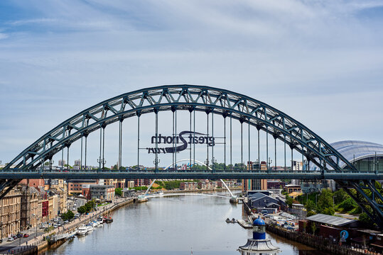 Newcastle upon Tyne, UK, 11 July 2022 - The Tyne Bridge in Newcastle upon Tyne. View of the old bridge. Millennium Bridge and Tyne Bridge