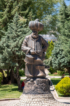 Aksehir, Turkey - July 04, 2022: The modern monument of the national hero Hoca Nasreddin and Aksehir city square