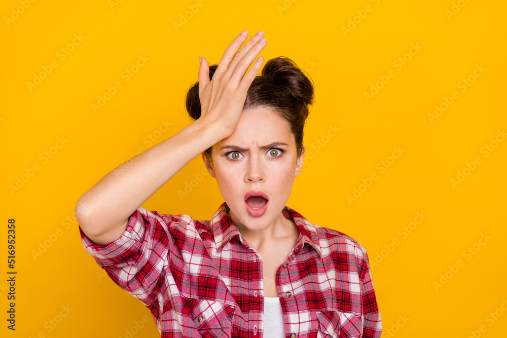 Sticker Portrait of unsatisfied lady hand touch forehead open mouth isolated on yellow color background