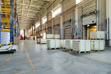 General view to the loading gates inside the warehouse.Interior of a modern warehouse storage....