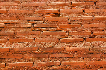 abstract closeup the aged orange brick wall