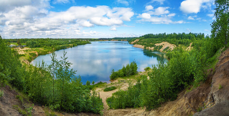 On the shore of the Pugarevsky quarry . Summer landscape. Leningrad region. Vsevolozhsk.