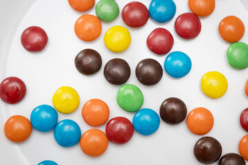 Variety of colorful candies coated