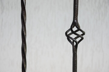 wrought iron stair railings.black metal on a white background.