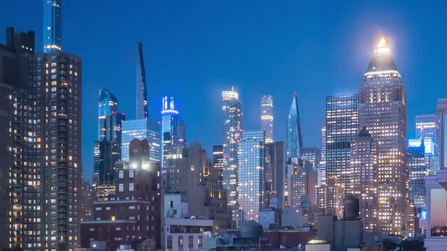 New York towers time-lapse at night.
Time lapse of New York cityscape at night.