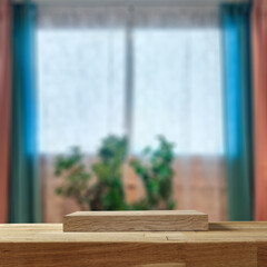Desk of free space and autumn blurred window backgrund. 