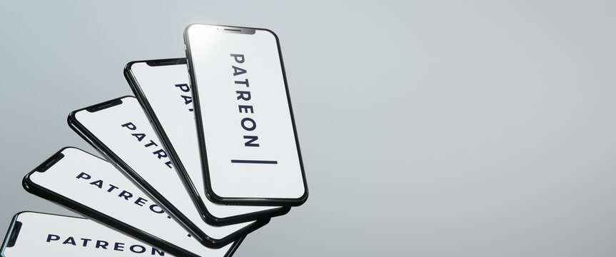 Patreon logo displayed on smartphones. Editorial illustration