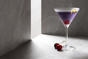 Classic aviation cocktail on gray background. Copy space