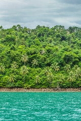 Fototapeta na wymiar Nature view of beautiful landscape Beach sea and forest. Blue sea water clear at Thailand.