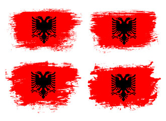 Artistic Albania country brush flag collection. Set of grunge brush flags on a solid background