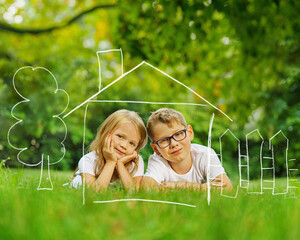 Family with a roof over their heads as a symbol for building a house