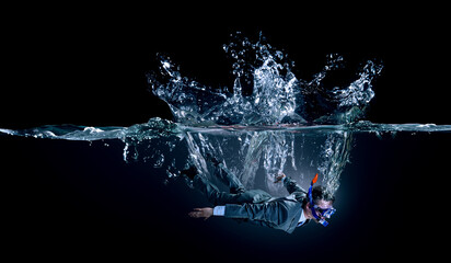 Funny businessman swimming underwater . Mixed media - obrazy, fototapety, plakaty