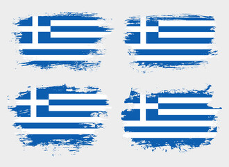 Obraz premium Artistic Greece country brush flag collection. Set of grunge brush flags on a solid background
