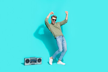 Full length photo of 90s atmosphere discotheque dancer funny man wear pullover isolated blue color background