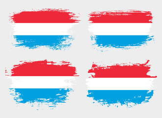 Artistic Luxembourg country brush flag collection. Set of grunge brush flags on a solid background