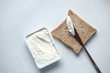low fact cheese cream spread on a bread 