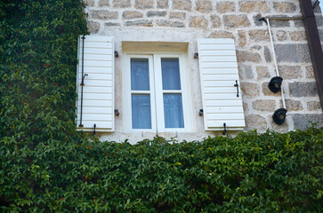 Fototapeta na wymiar Window of a coastal house