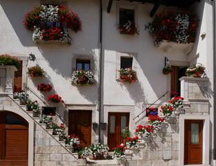 Fototapeta na wymiar Pescocostanzo - Abruzzo - Italy - The country of flowers with the characteristic architecture of the houses.