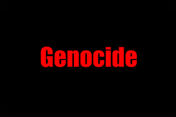 Fototapeta na wymiar Genocide. Inscription means death and misfortune made red on black. Worldwide cataclysm. Intervention with the help of the army and weapons. Death of innocent victims