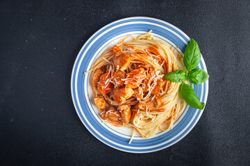 spaghetti pasta chicken tomato sauce fresh healthy meal food snack diet on the table copy space food background rustic top view