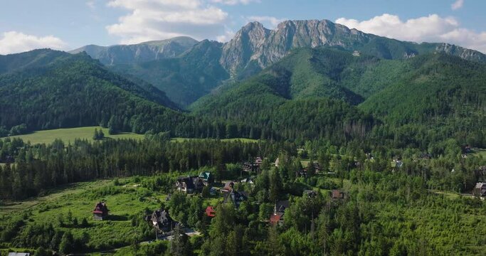 Aerial view of Zakopane in Tatra mountains - beautiful landscape and houses at the foot of the mountains in summer