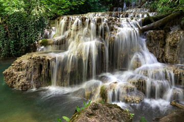Obraz premium Cascade waterfalls. Krushuna falls in Bulgaria near the village of Krushuna, Letnitsa.