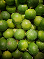 Fresh green lime pile in harvest season