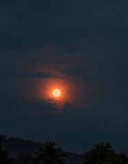 full moon with dark clouds