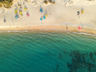 vertical drone photography of aquatics sports on beach, milos island, Greece, copy space
