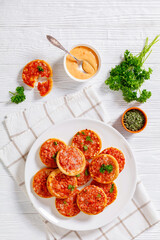 mini pizzas with ham and pecorino cheese, top view