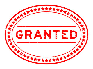 Grunge red granted word oval rubber seal stamp on white background