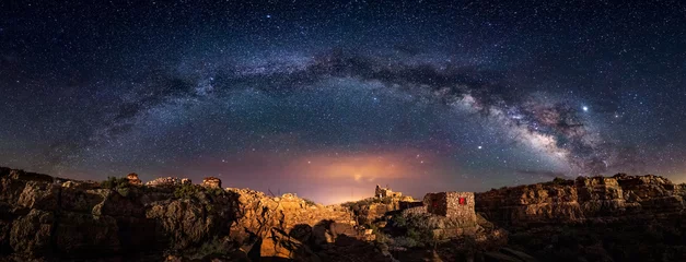Fotobehang Two Guns:  The ruins of two guns remain standing on Route 66 in Arizona under the Milky Way © Chrisfloresfoto
