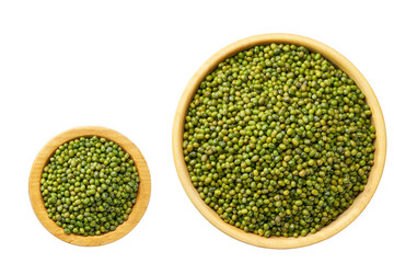 Raw mung beans in a wooden bowl isolated on white background top view.