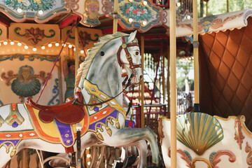Carousel. Horses on a carnival Merry Go Round