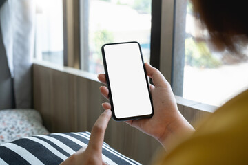 woman hand holding texting using mobile at cafe. background empty space for advertise.work people contact marketing business,technology.