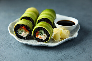 Crab sushi roll wrapped in avocado