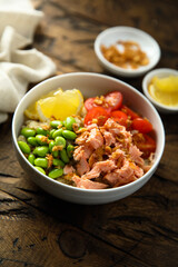 Healthy salmon poke with edamame beans