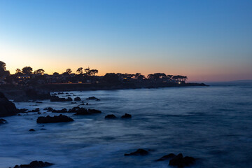 Obraz premium Pacific ocean sunset with the coast