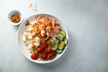 Healthy salmon poke with crunchy onion