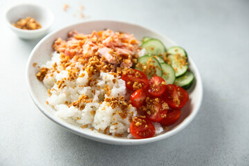 Healthy salmon poke with crunchy onion