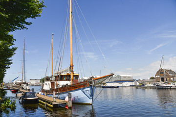 Fototapeta na wymiar Den Helder, Netherlands. July 2022. An old Fishing trawler in the port of Den Helder.