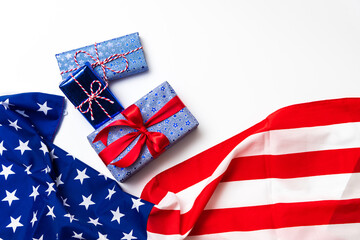 Fototapeta premium 4th of July American Happy Independence Day card with gift boxes in national colors american flag on white background