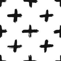 Seamless pattern with ink hand drawn crosses on white background. Black ink grunge texture. Perfect design element for fabric, textile, wrapping paper. 